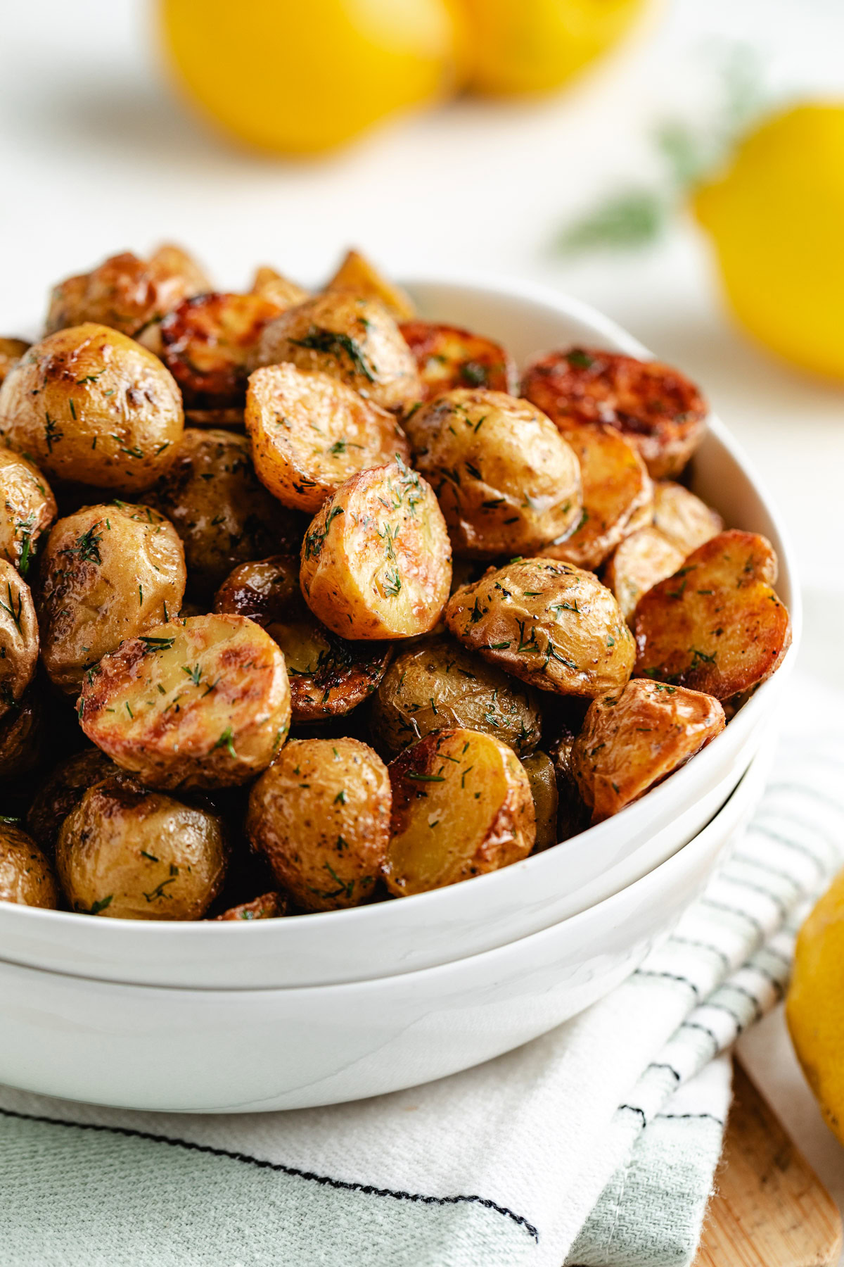 Side view of roasted potatoes with golden edges.