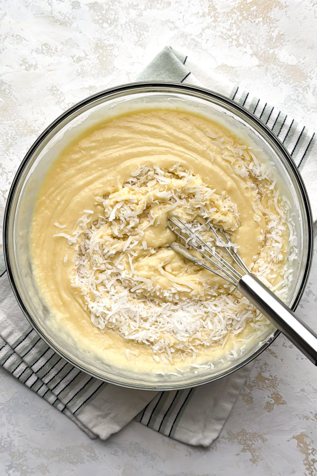 Shredded coconut folded into the batter.